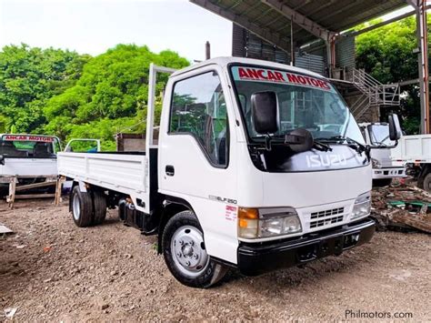 Used Isuzu ELF 10FT DROPSIDE TRUCK .